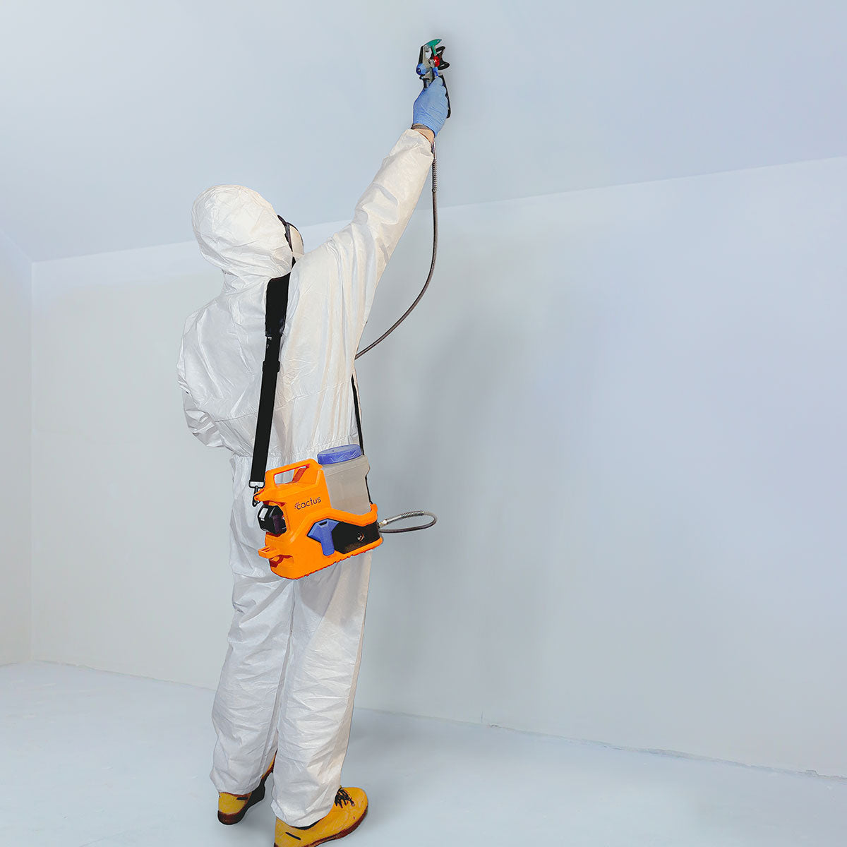 Painter uses Cactus Airless Sprayer to paint indoor ceiling